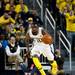 Michigan junior Tim Hardaway Jr. dribbles down the court in the game against Illinois on Sunday, Feb. 24. Daniel Brenner I AnnArbor.com